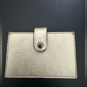 Used excellent condition coach Metallic Gold Leather Card Holder accordion